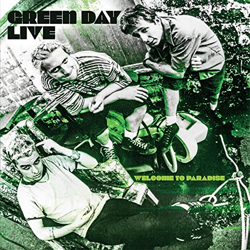 Green Day album cover featuring three band members in green tones.