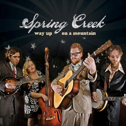 "CD cover featuring four musicians holding instruments, with 'Spring Creek' and 'way up on a mountain' text."