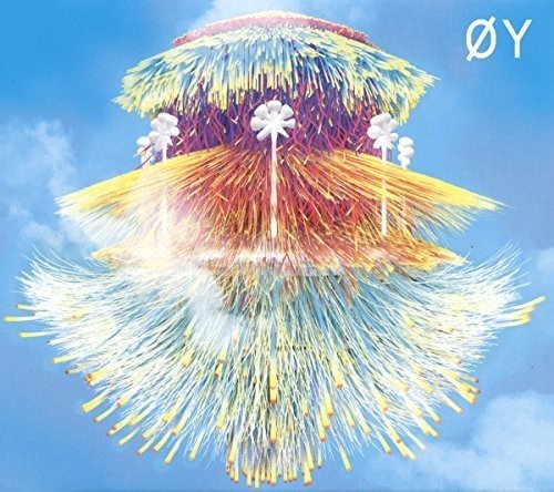 The image depicts a vibrant, abstract artwork with a blue sky background and white clouds. For accessibility purposes, a concise alt text could be: "Colorful, abstract artwork with dandelion-like structure against a blue sky."