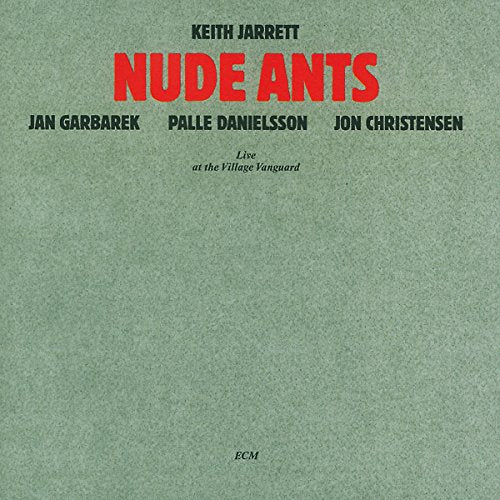 "Album cover with 'Nude Ants' in red text on a textured grey background."