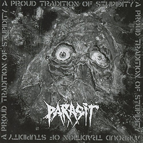 CD cover: dark, textured image of a grotesque face with large eyes.
