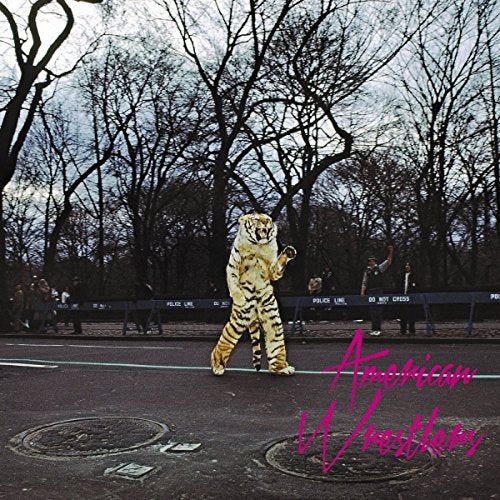 CD case titled "American Wrestlers" with a CD disc inside, compact disc album packaging.