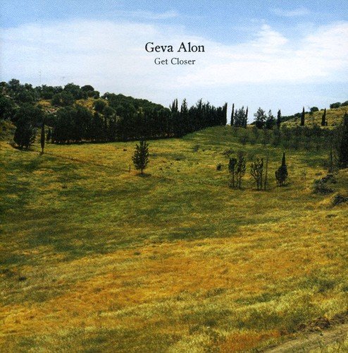 "CD album cover with a serene landscape featuring rolling hills and trees under a blue sky."