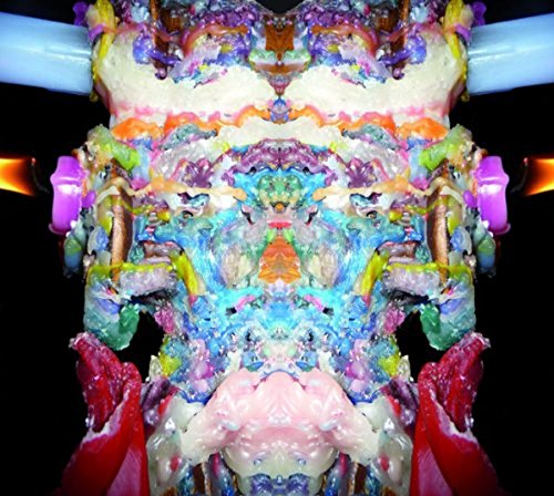 Symmetrical, colorful abstract design resembling a figure with outstretched arms.