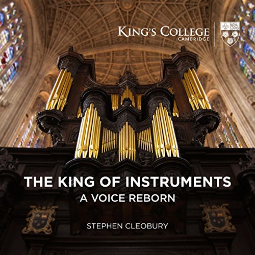 "CD cover featuring a large pipe organ in a cathedral with stained glass windows."