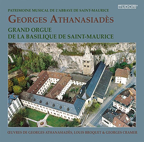 A CD cover featuring an aerial view of a monastery.