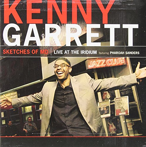 Kenny Garrett album cover with a man standing outside a jazz club.
