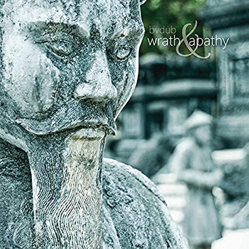 Close-up of a weathered stone face with album title overlayed.