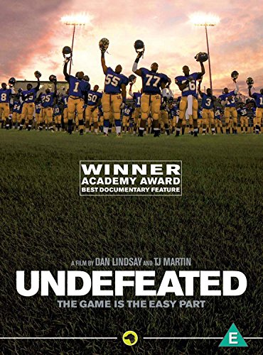 Football team celebrating on a field, DVD cover for "Undefeated".