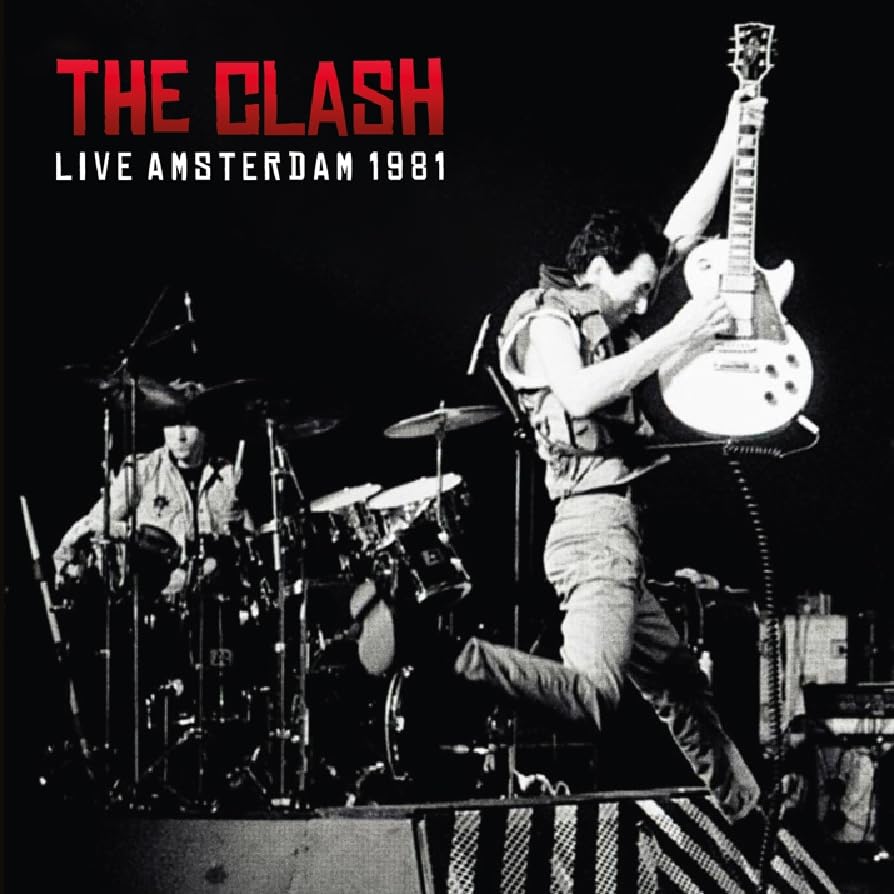 Black and white photo of The Clash performing live on stage in 1981.