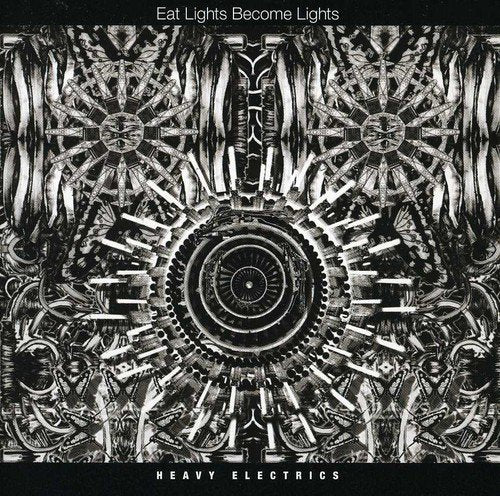 Black-and-white album cover with intricate, symmetrical design and text "Eat Lights Become Lights" and "Heavy Electrics".