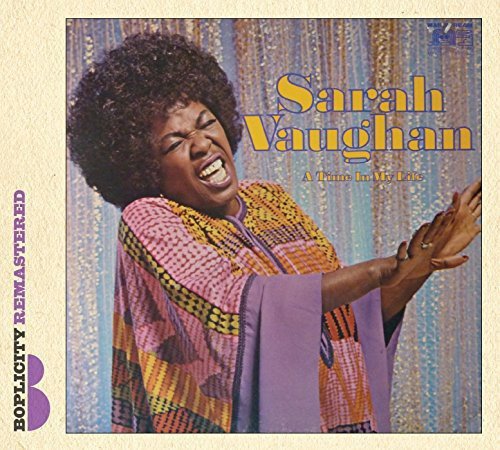 Sarah Vaughan album cover featuring a smiling woman with afro, wearing a patterned top.