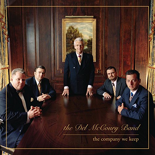 "CD cover with four men in suits around a table, one standing."