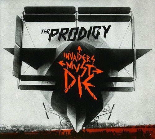 "Album cover featuring a zeppelin with 'The Prodigy' and 'Invaders Must Die' text."