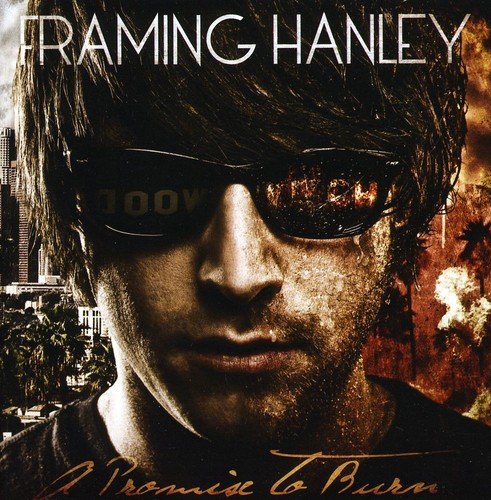 "Framing Hanley's album cover: a man with sunglasses against a cityscape on fire."
