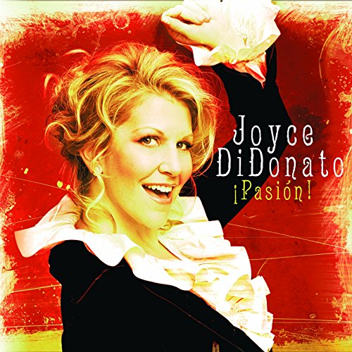 Joyce DiDonato smiles on the album cover for “¡Pasión!” with red background.