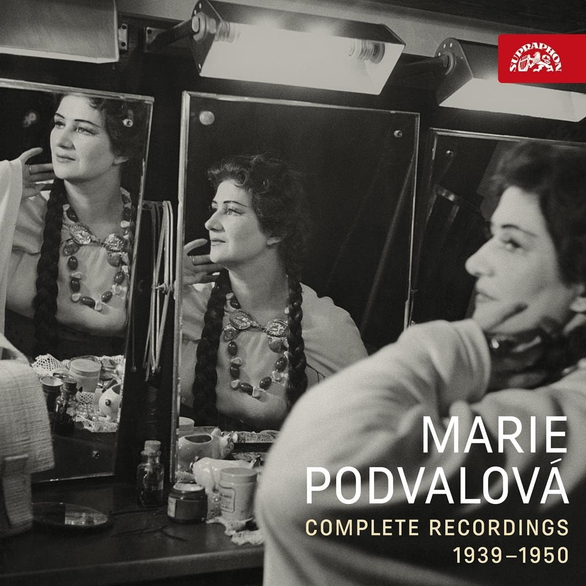 Black and white CD cover featuring opera singer Maria Podvalova and reflections.