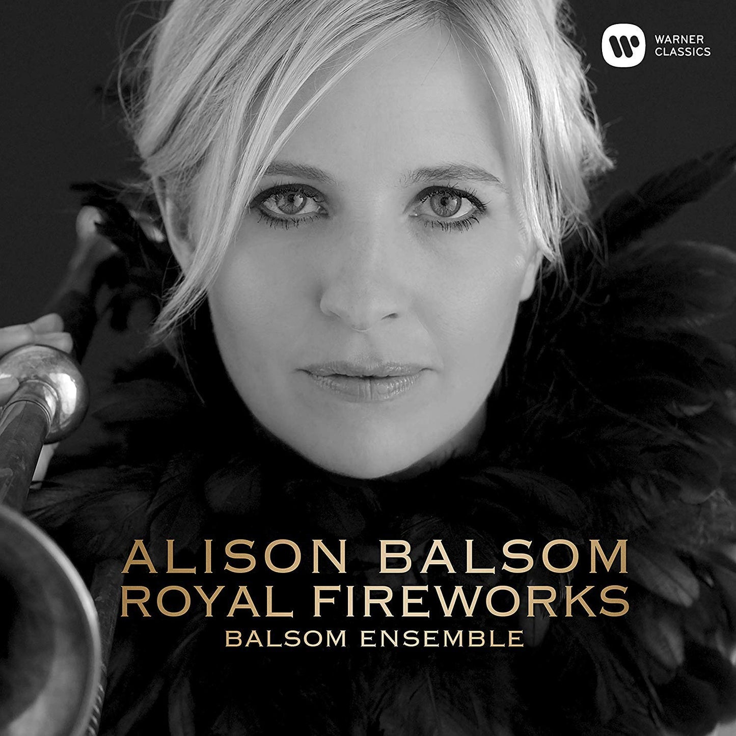 Black and white image of a woman holding a trumpet, with gold text overlay.
