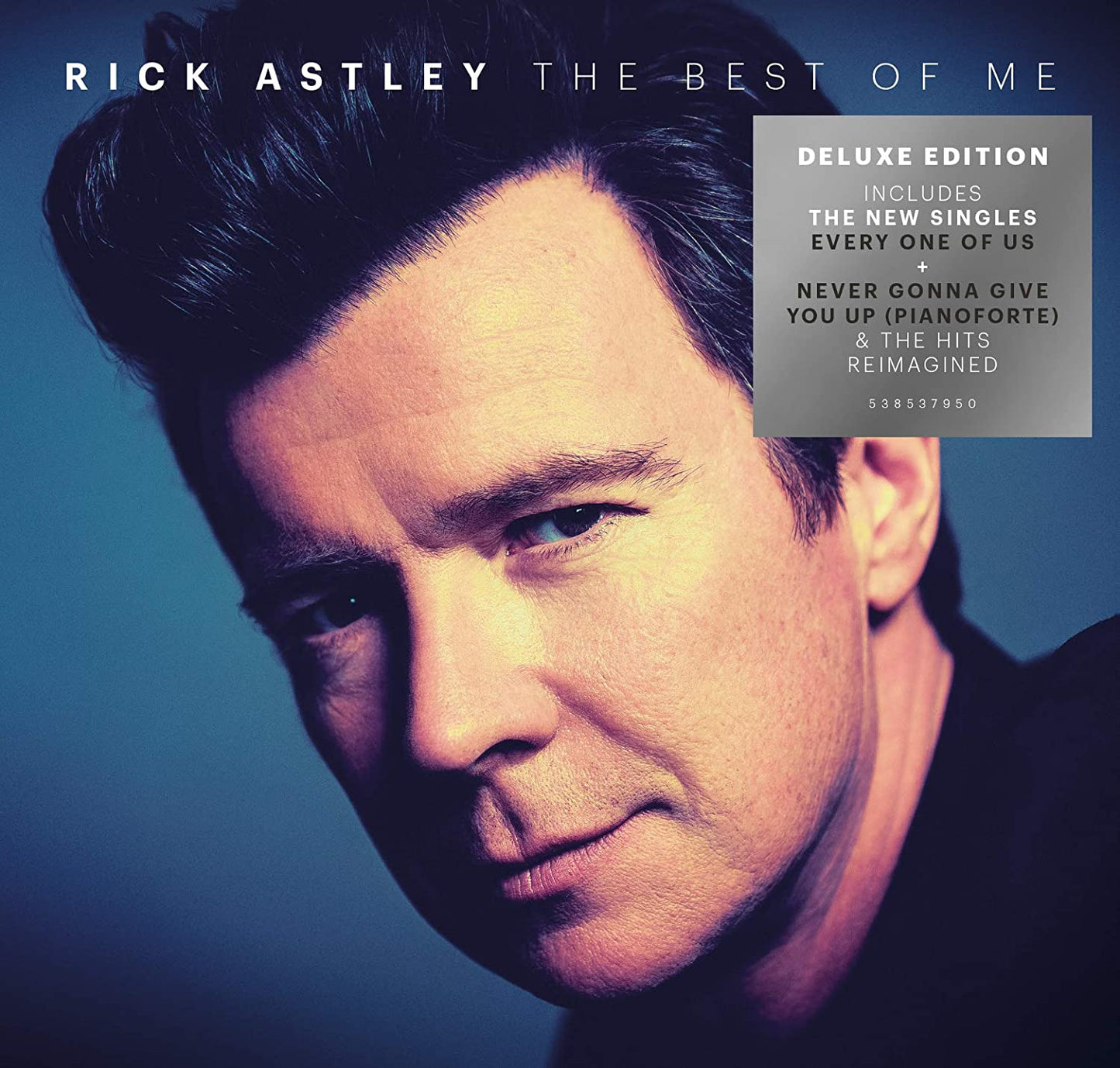 "Album cover featuring a close-up of Rick Astley's face against a blue background."