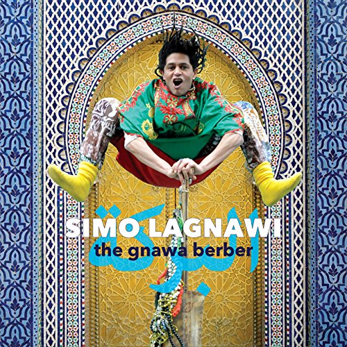 "CD cover featuring a man in traditional clothing sitting on a decorated pole."