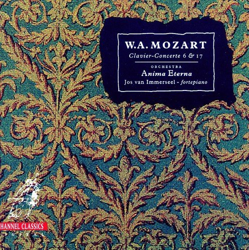"CD cover with green and gold pattern, black label featuring Mozart's name."