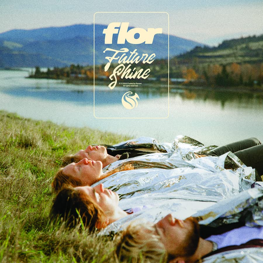 CD cover for “flor - Future Shine” featuring people lying in grass.