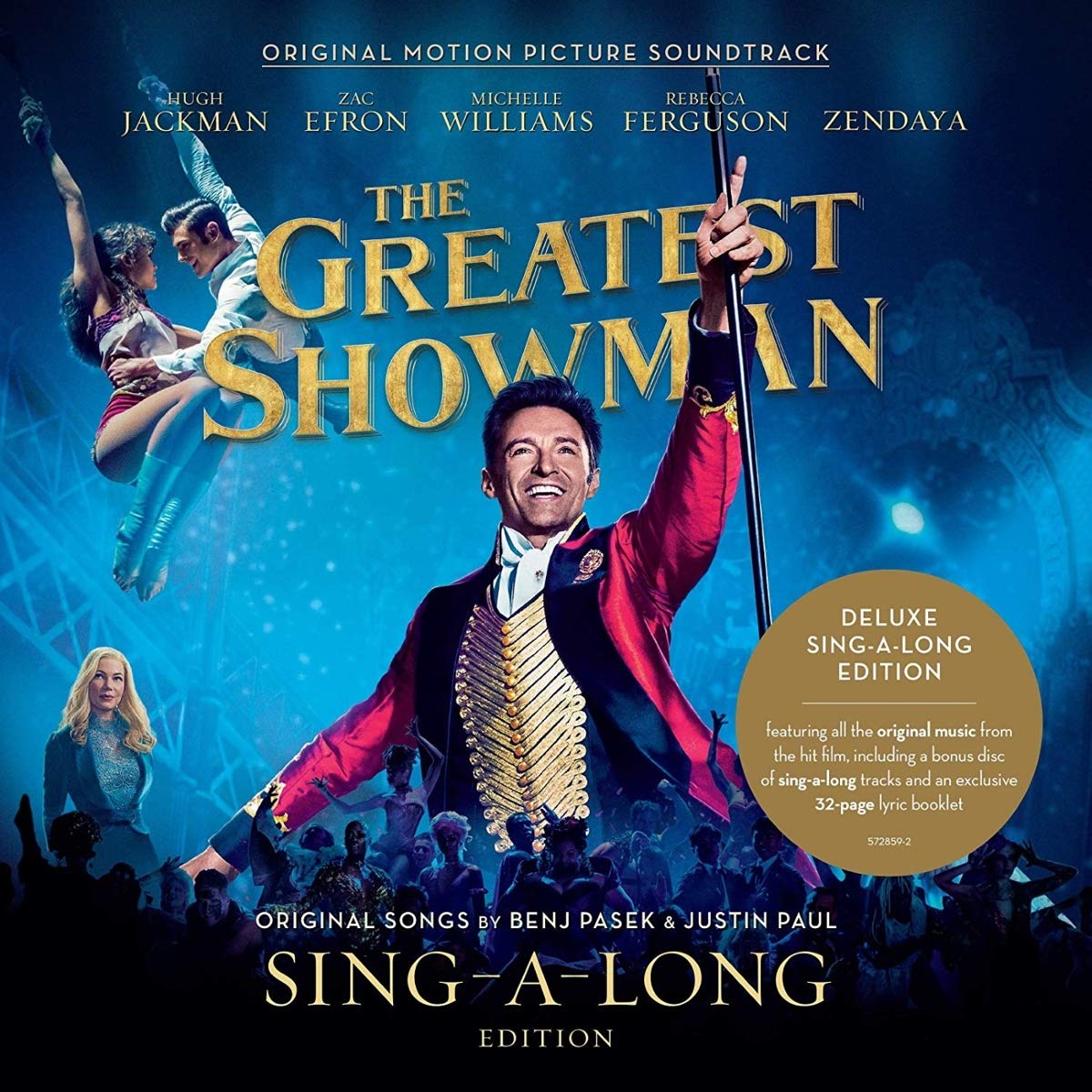 "The Greatest Showman" soundtrack cover featuring a man in a red coat with performers.