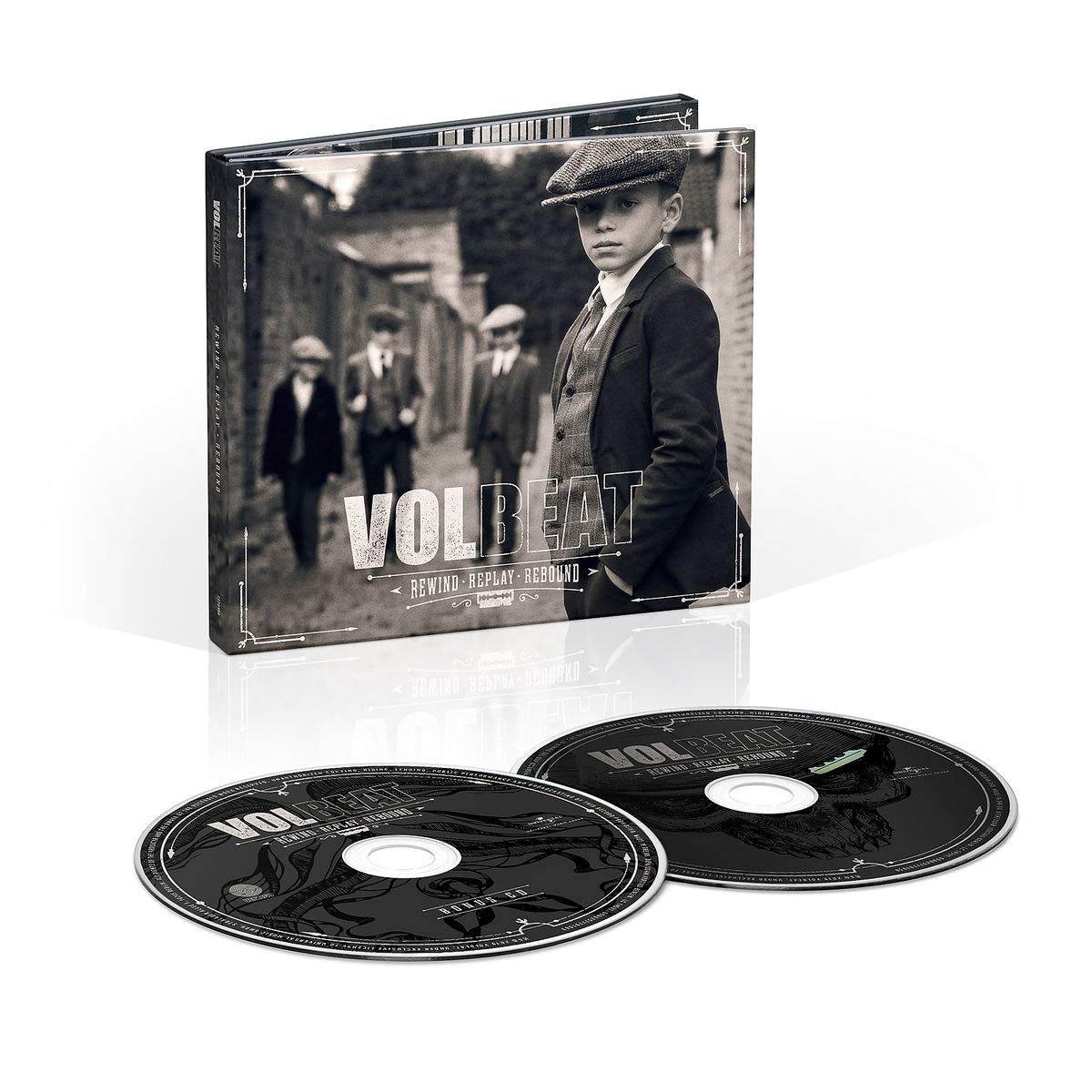 A black-and-white image of a boy and three men in old-fashioned suits and hats.