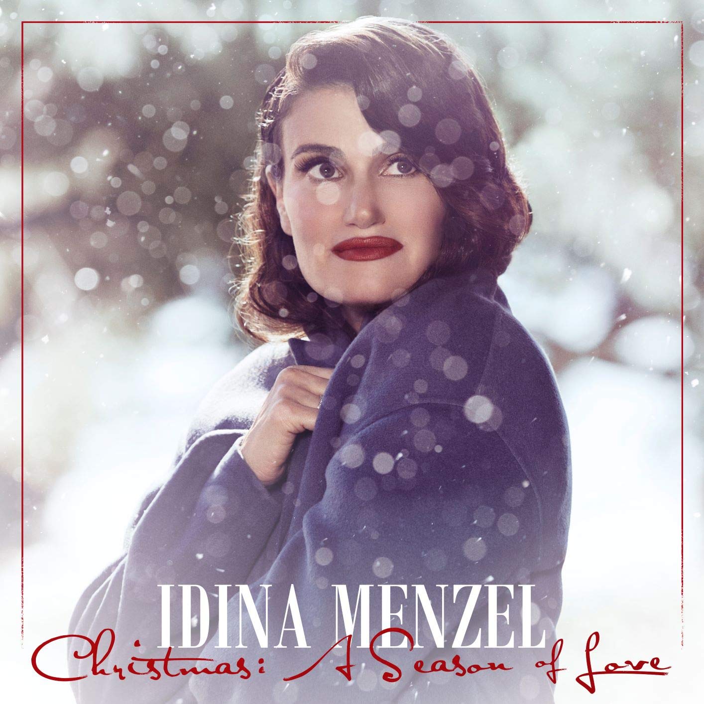 Idina Menzel's album cover: a woman in a coat surrounded by snowflakes.