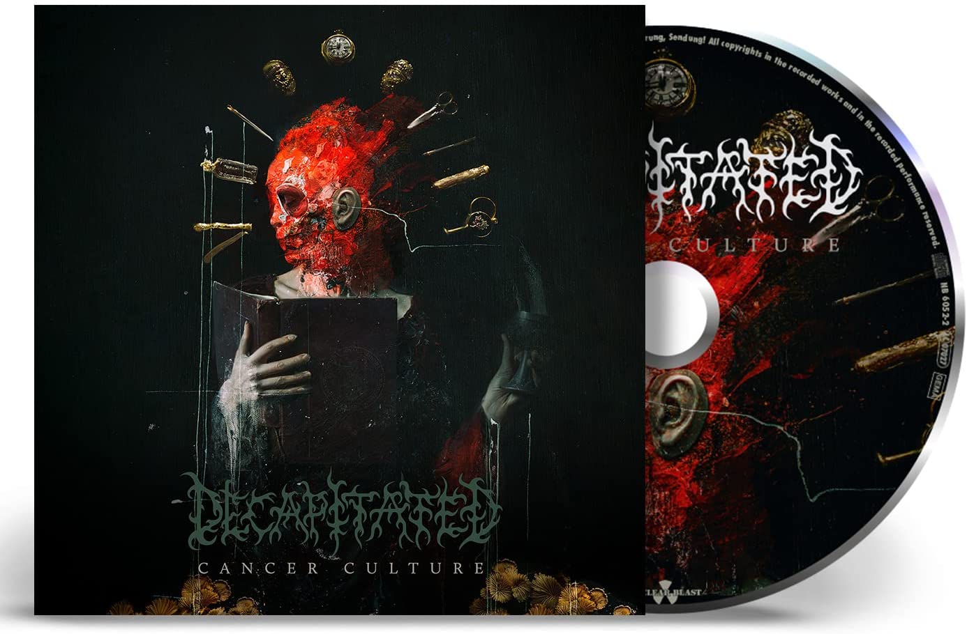 "CD case and disc with dark cover art featuring a red, distorted head and syringes."
