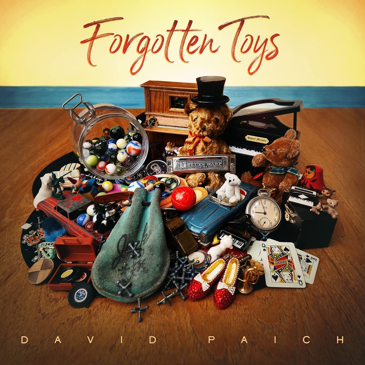 Album cover: "Forgotten Toys" by David Paich, featuring vintage toys.