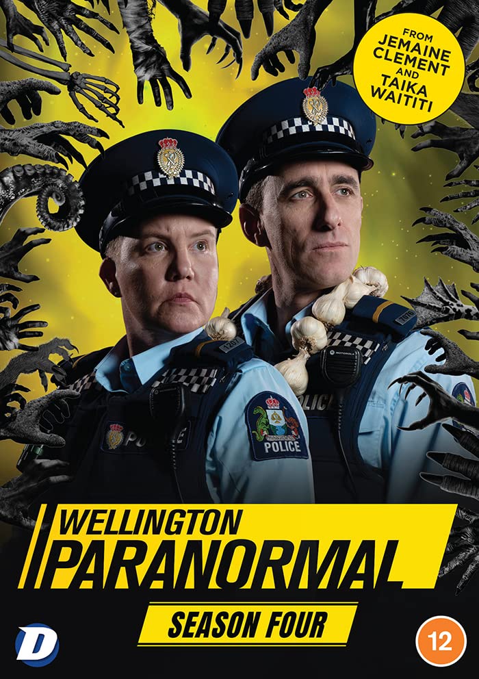 Two police officers surrounded by monster hands on a yellow background, Wellington Paranormal DVD cover.