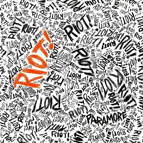 The image is a white square with black and orange handwritten text. For accessibility purposes, a concise alt text could be: "Album cover with 'Riot!' in orange, surrounded by 'Paramore' and 'Riot!' in black."