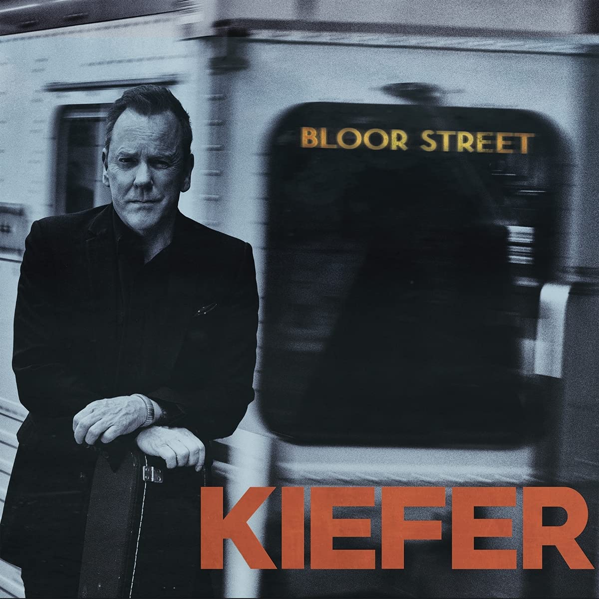 Album cover with man standing beside a subway train, "Kiefer" and "Bloor Street" text.