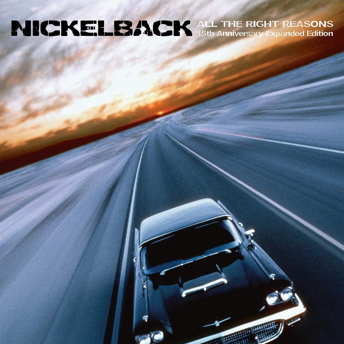 "Album cover featuring a black car driving down a highway at sunset."