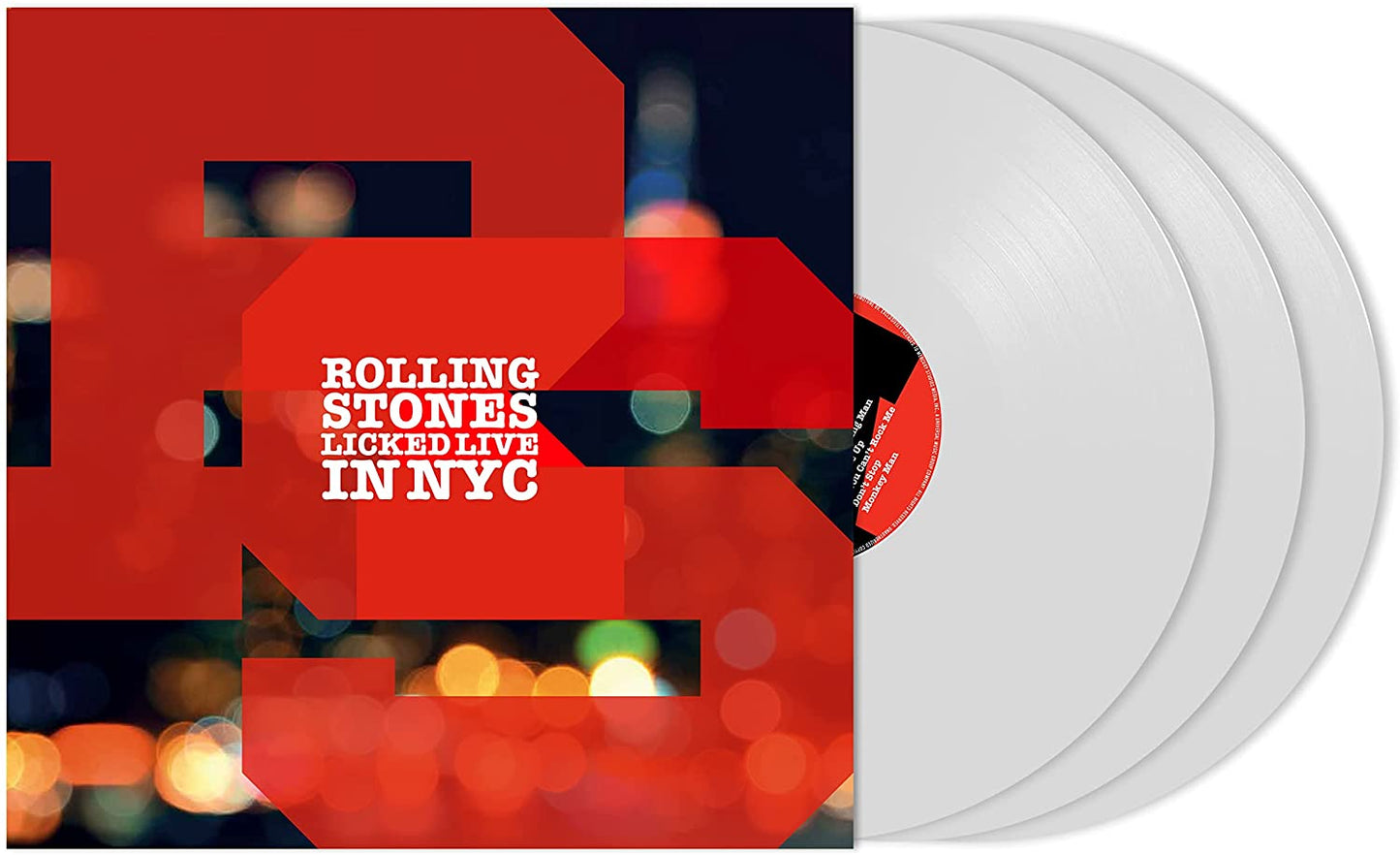"Red '65' with white text on blurred, colorful background, Rolling Stones album cover."