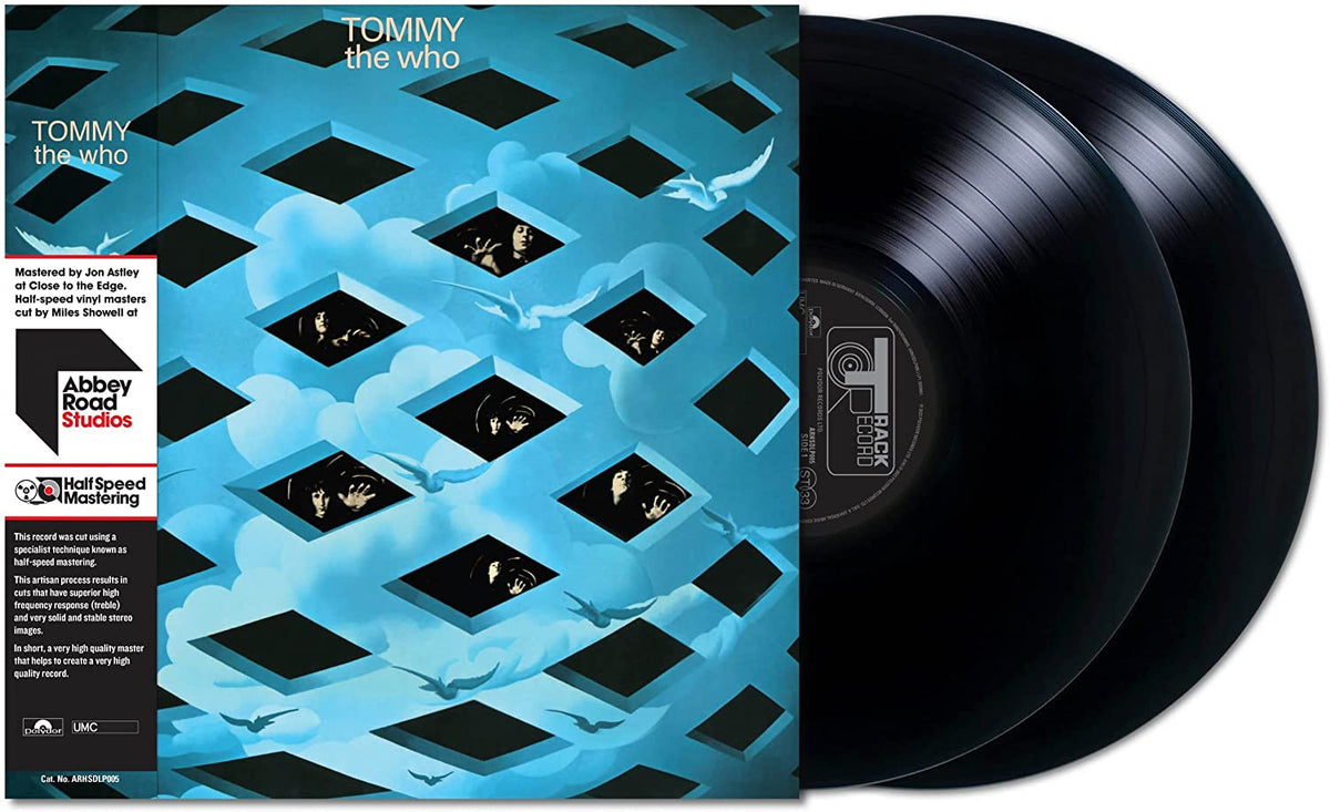 Album cover for The Who’s “Tommy” featuring faces in blue diamond-shaped windows.