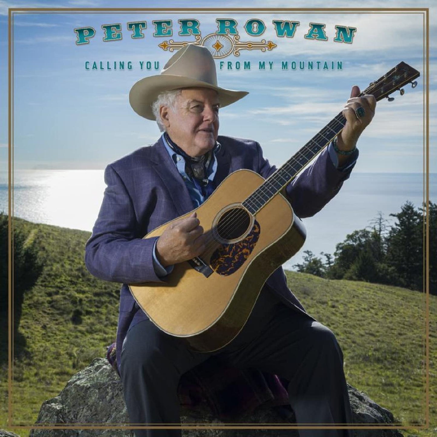 Album cover featuring Peter Rowan holding a guitar, sitting on a rocky hillside.