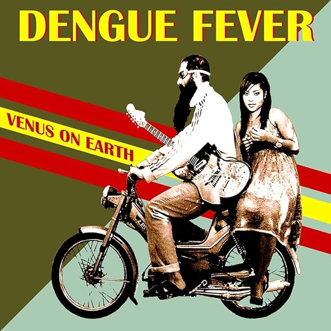 Album cover: couple on a motorcycle, sepia-toned, bold text overlay.