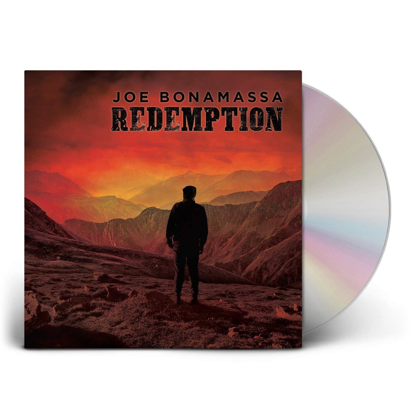 "Album cover with a man standing in a red mountain landscape, titled 'Redemption'."