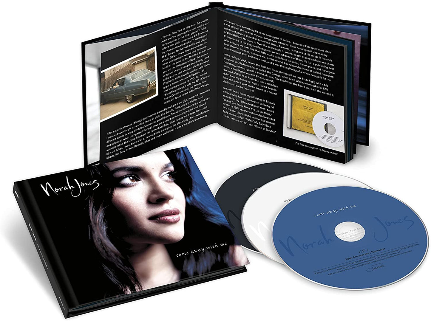 Norah Jones album cover, close-up portrait, dark hair, blue background.