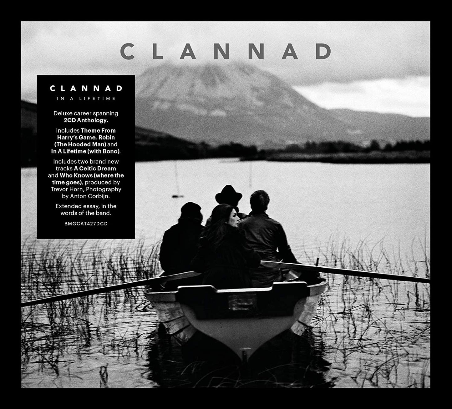 "Black and white album cover with men in a boat on a lake."