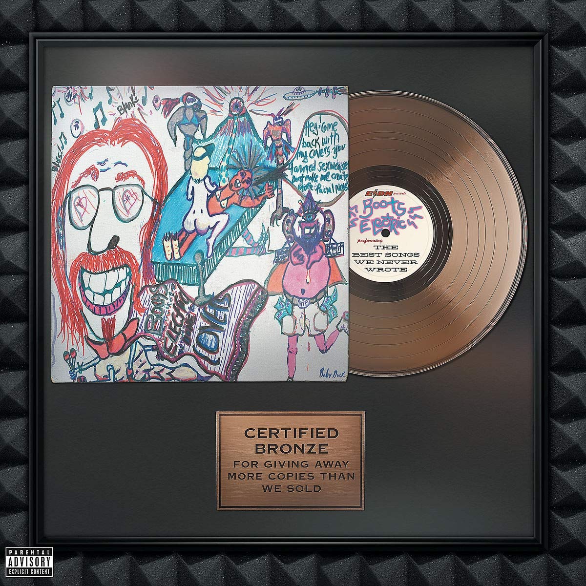 Framed bronze record with album cover art and plaque on a black background.