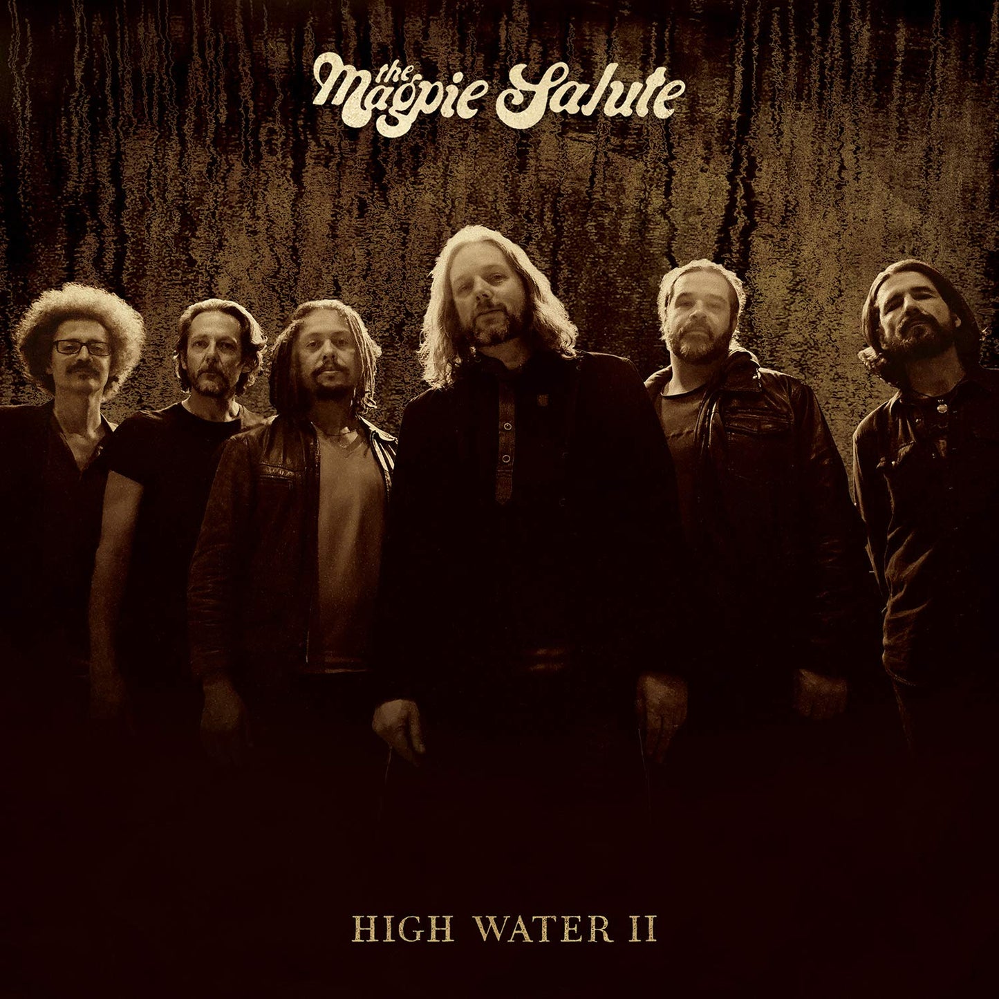 "Album cover featuring sepia-toned image of six men standing together, looking upwards."