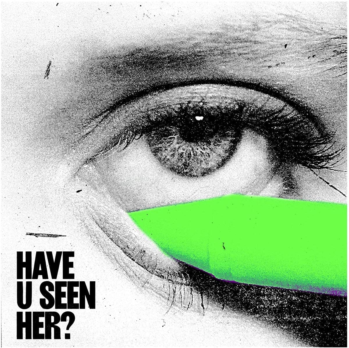 A close-up of a woman's eye with green tape over her mouth.
