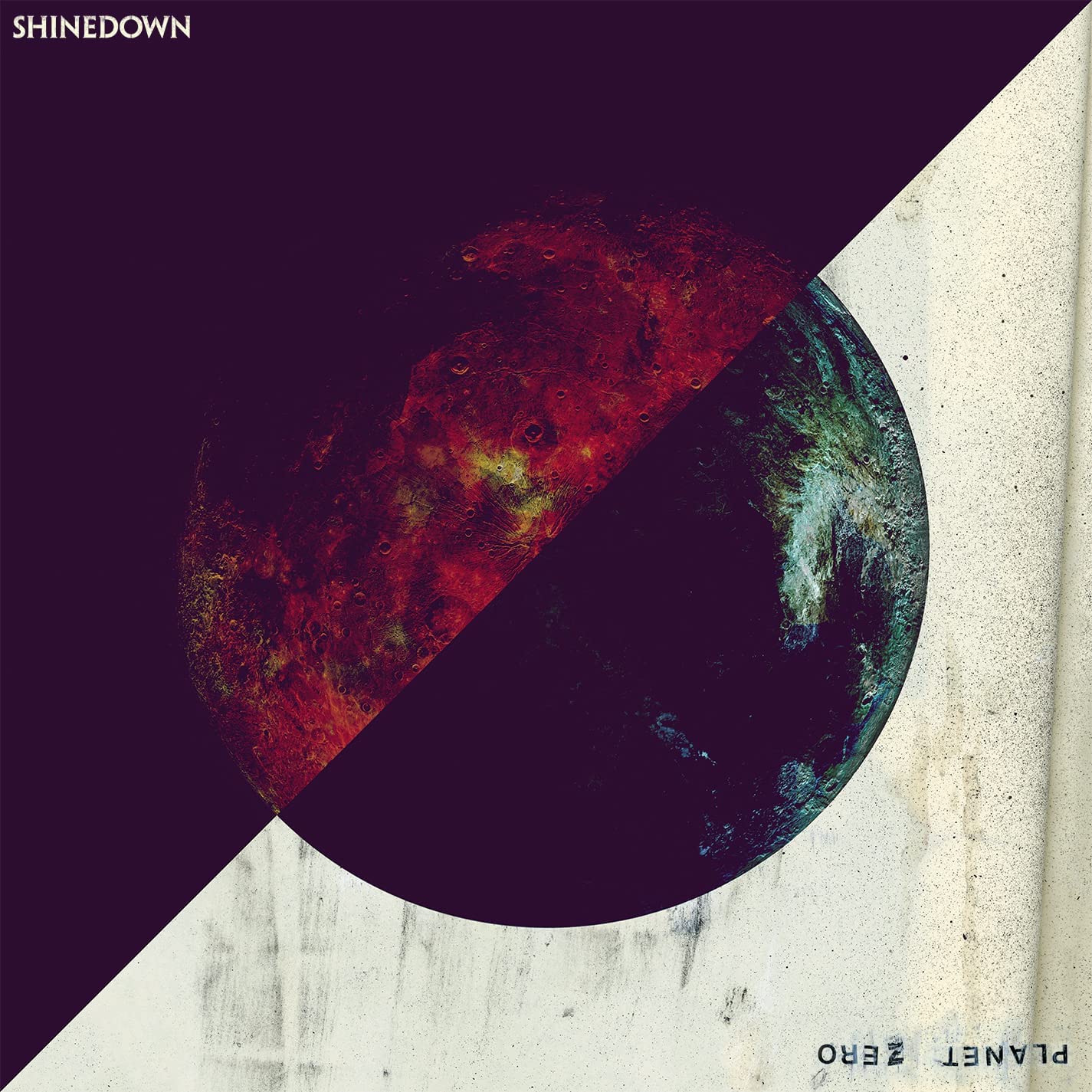 "Album cover with a split-colored planet against a dark and light background."