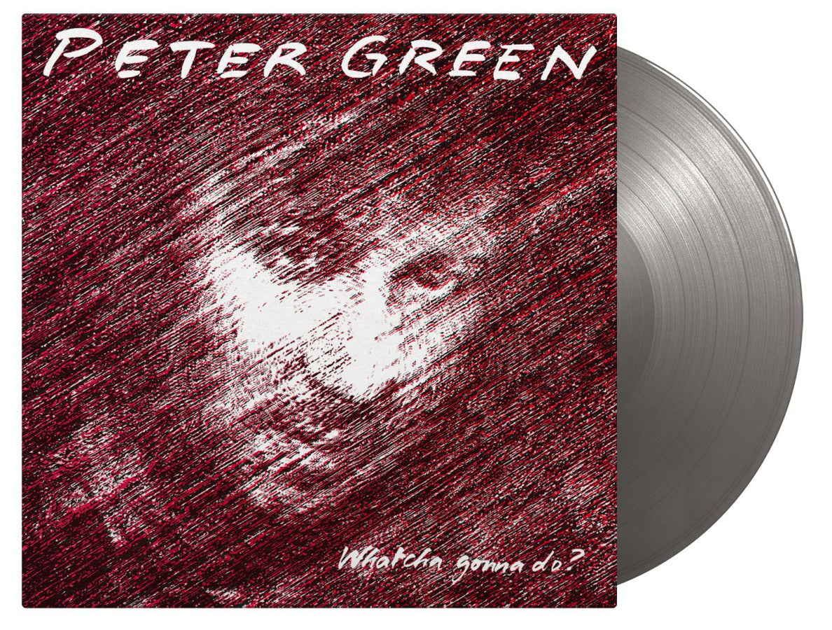 Peter Green album cover and silver vinyl record shown at angle.