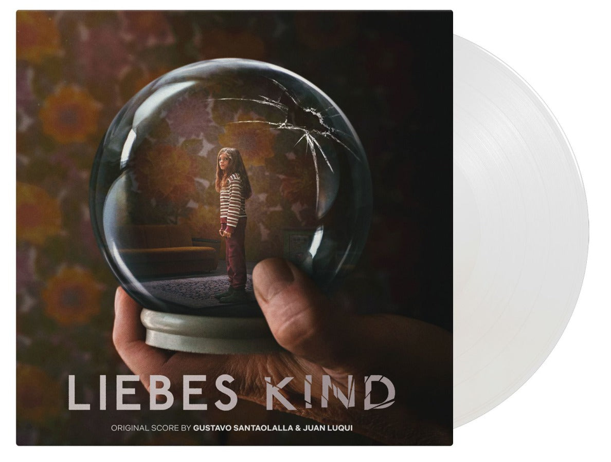 Vinyl record cover featuring a child in a snow globe, cracked glass.