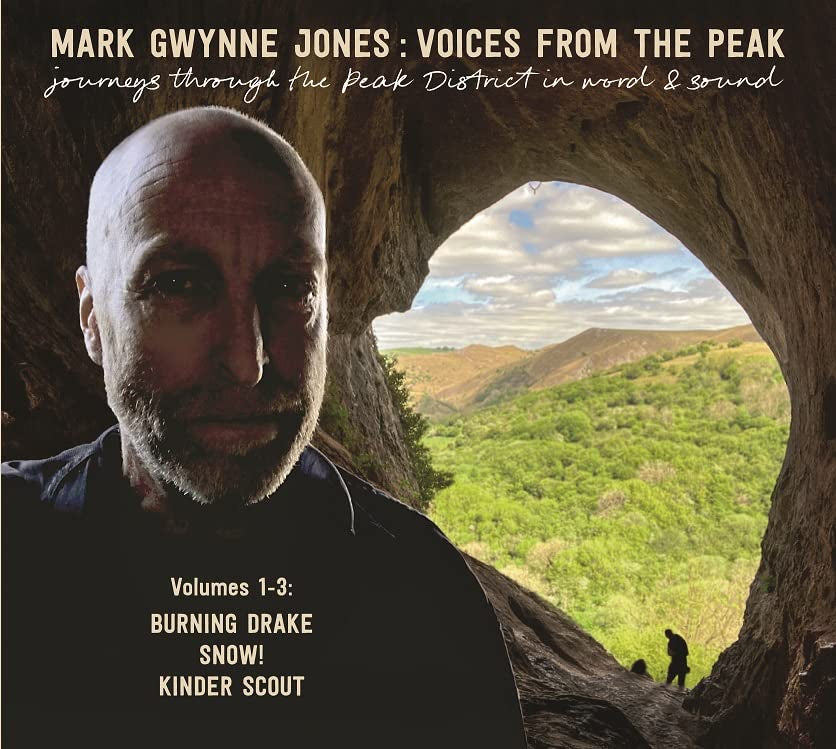 CD cover featuring a man framed by a cave opening overlooking a landscape.
