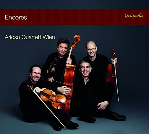 Arioso Quartett Wien, a string quartet, posing with their instruments.